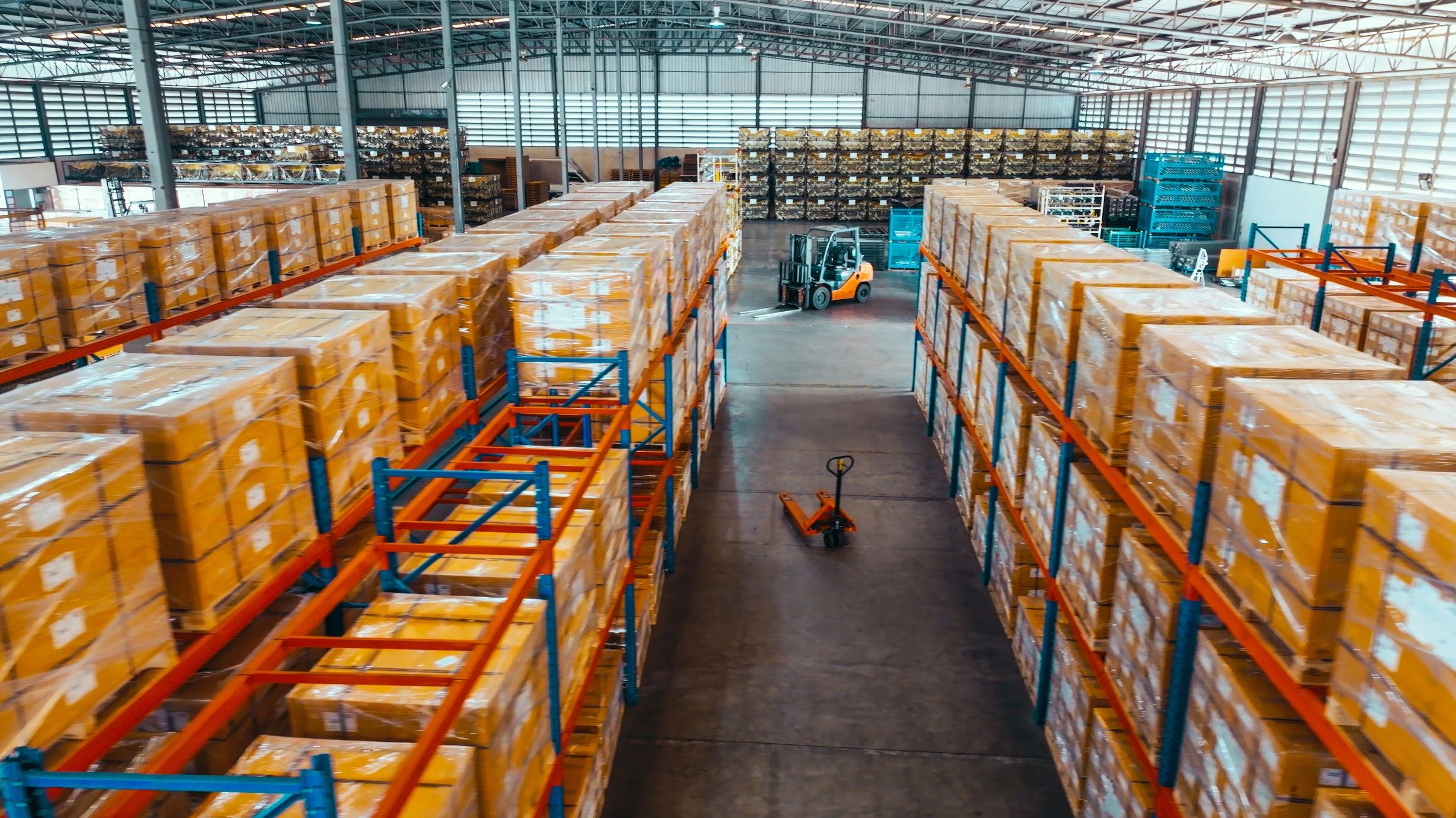 Warehouse shelves with packaged goods representing organized logistics