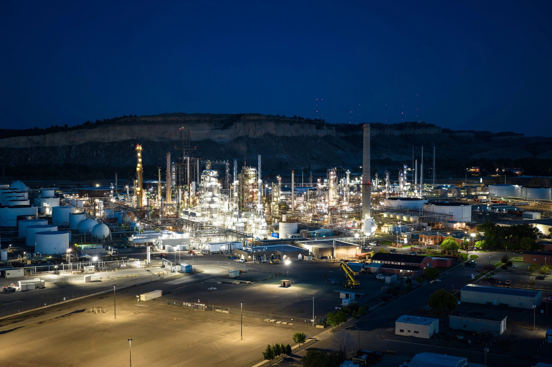 Aerial view of an oil refinery at dusk